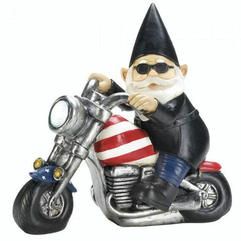 A biker gnome with a leather vest and helmet, sitting on a motorcycle.